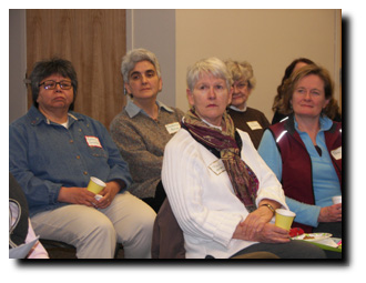 small group listens at meeting