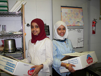 Nina Daoud and Nadia Daoud are two of many who helped out in the kitchen to make sure all 230 women were fed.