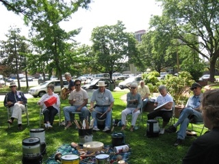 Rapha leads drumming.